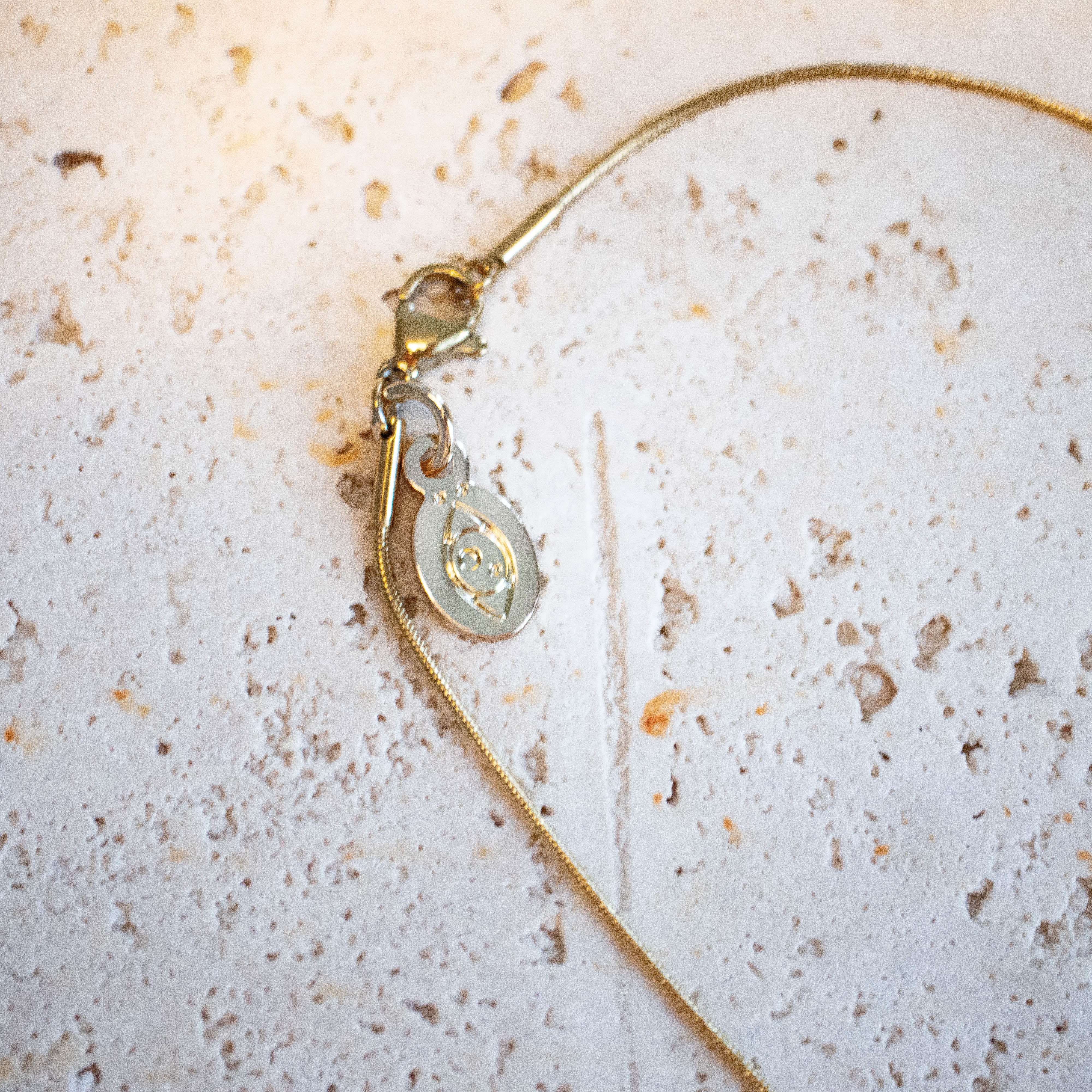 ready. Dinosaurier Kette Langhals vergoldet Edelstahl | Nooe Berlin - Nooe UG