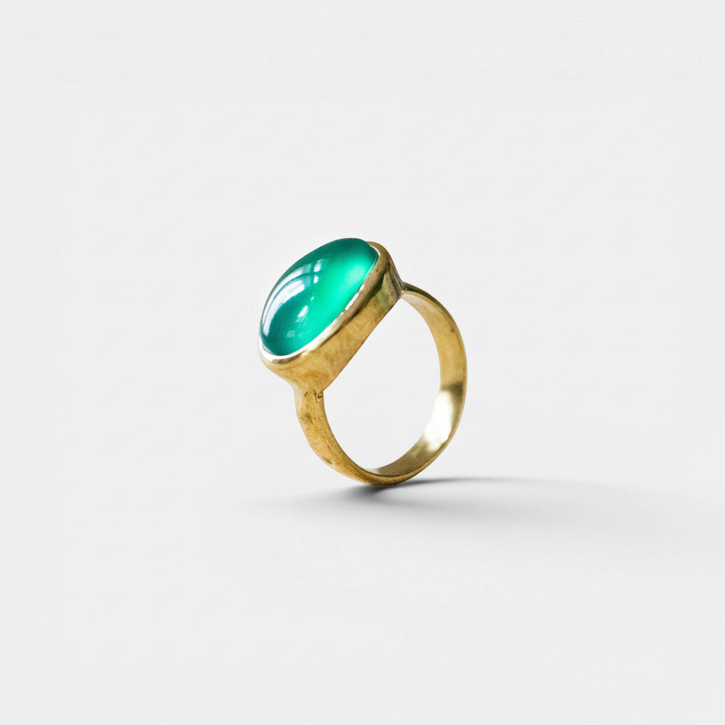 Nooe UG large oval green onyx ring in gold-plated brass. Handmade statement jewelry.