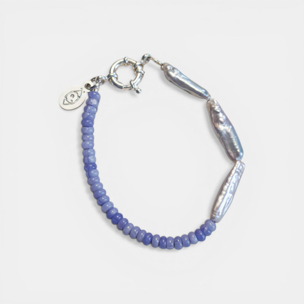 Nooe Berlin light blue bracelet with small faceted beads and elongated freshwater pearls, silver clasp.