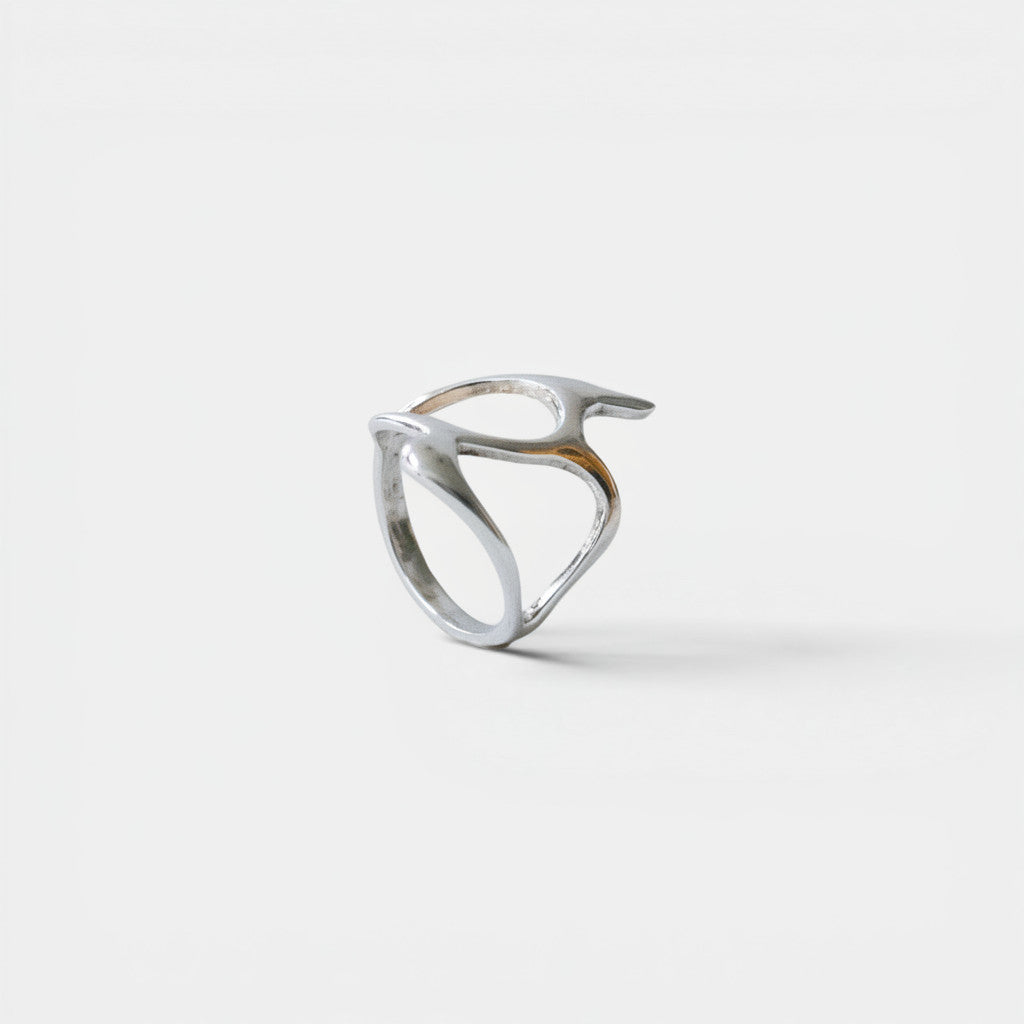Nooe UG organic silver ring with tribal-inspired, abstract design. Handmade 925 sterling silver.