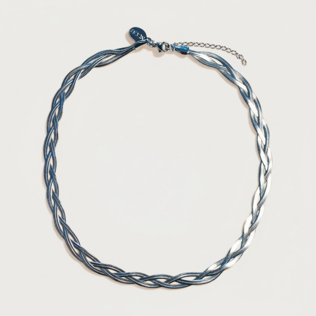 Nooe UG silver braided herringbone stainless steel necklace with flat, elegant design.