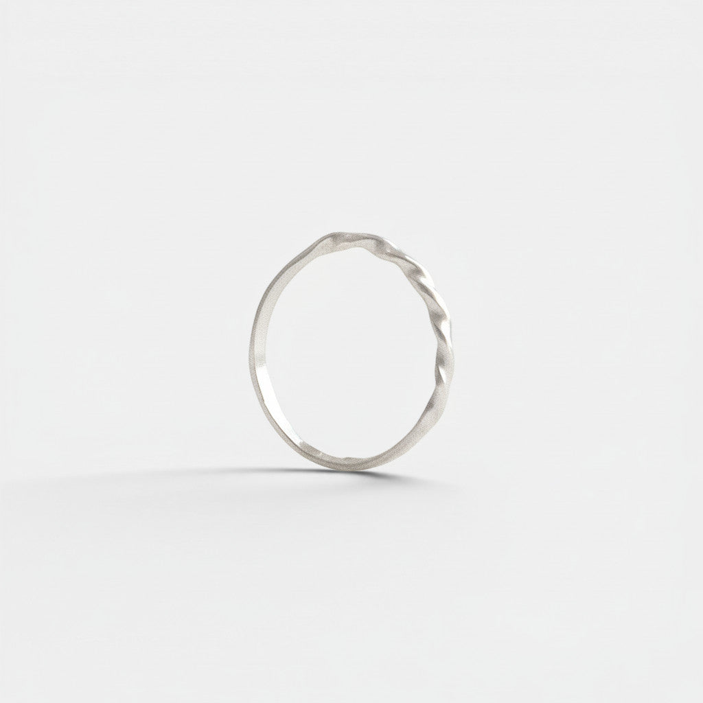 Nooe UG fine twisted ring in 925 sterling silver, handmade, minimalist design, suitable for stacking.