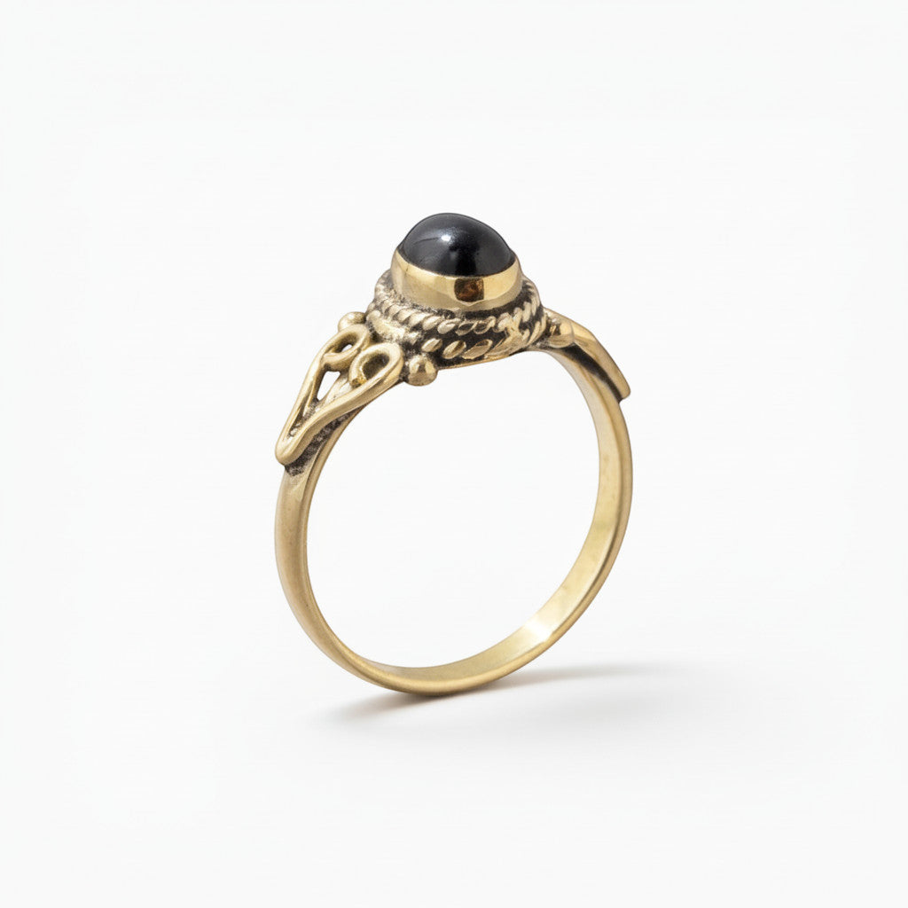 Nooe UG handmade brass ring with oval black onyx stone in Art Nouveau style, eye design.