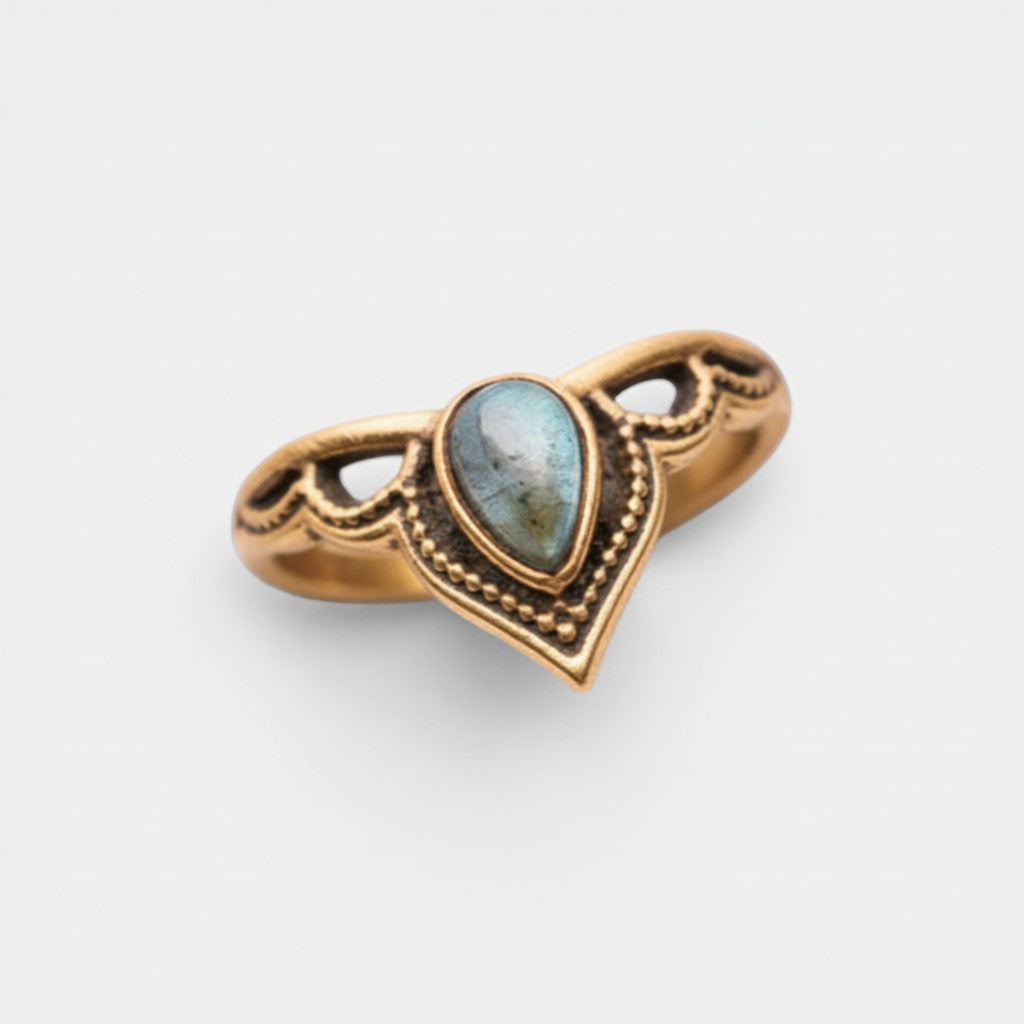 Nooe UG gold brass tiara ring with pear-shaped labradorite centerpiece and intricate beaded details.