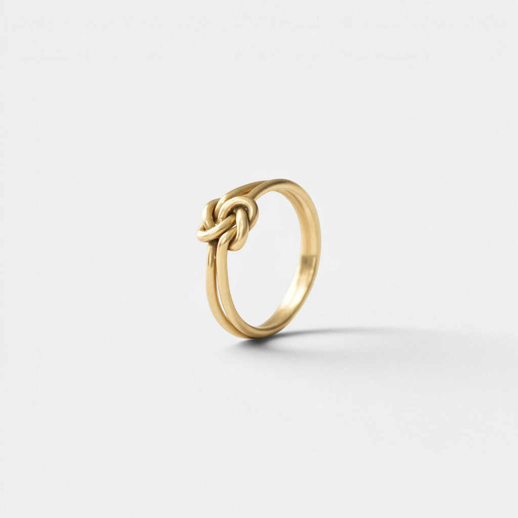 Nooe UG gold brass knot ring with movable elements, minimalist design, anxiety ring.
