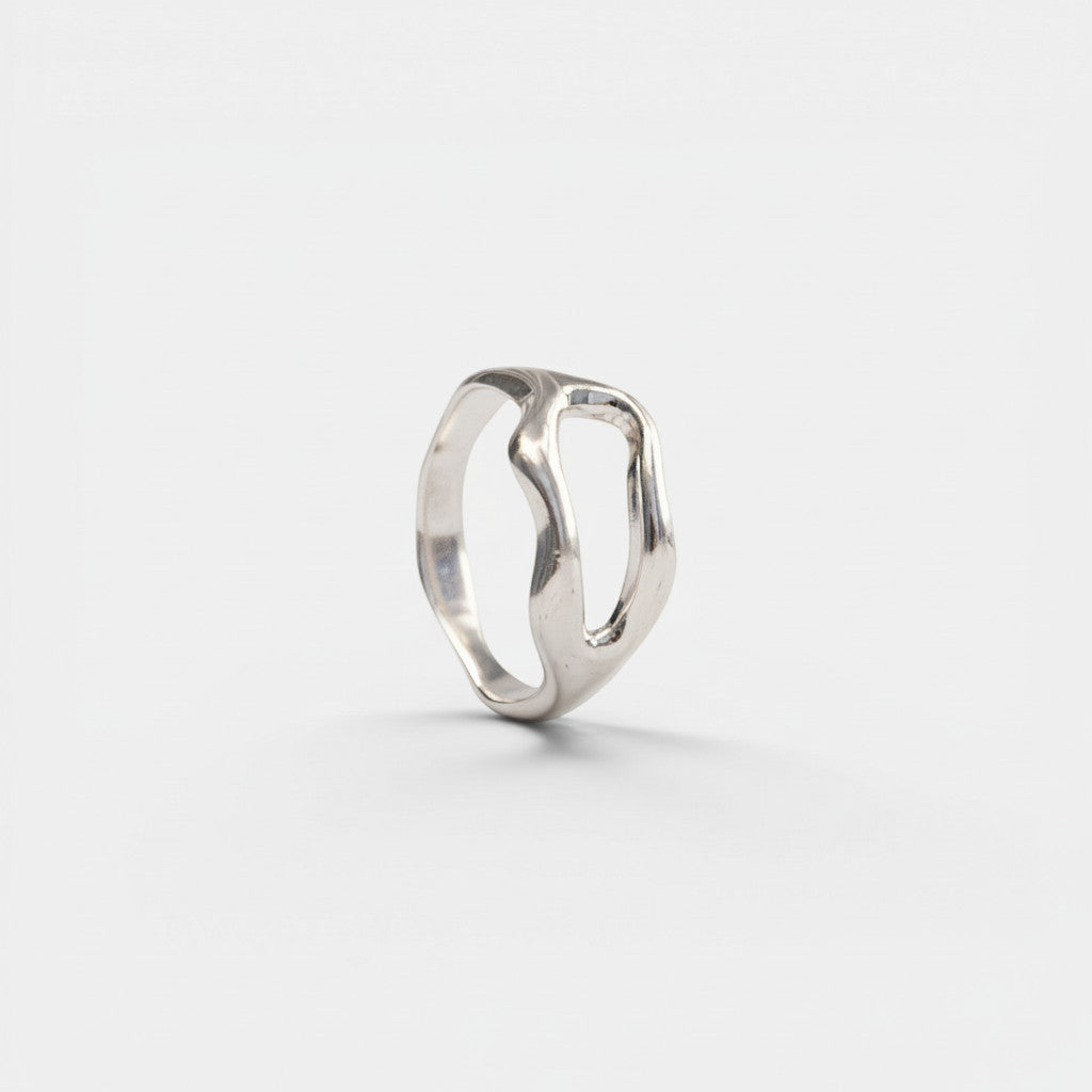 Nooe UG organic 925 sterling silver ring with a smooth, polished, asymmetrical design.