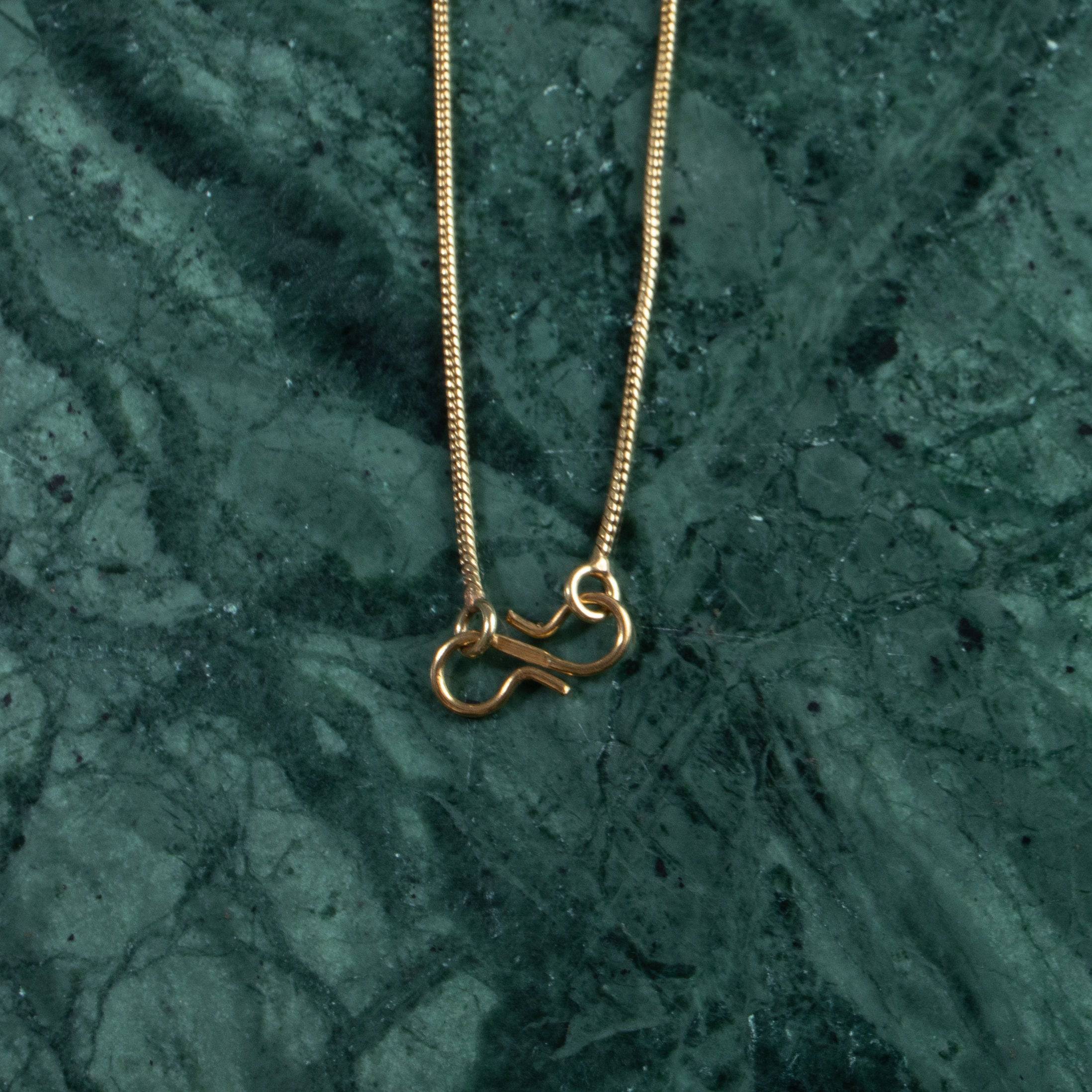 Kauri-Muschel-Halskette handgefertigt Messing gold - NooeBerlin